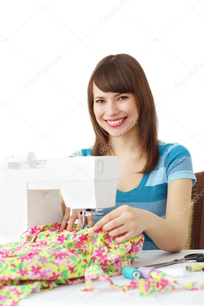 Woman using sewing machine to sew clothing — Stock Photo © AnmFoto 4579658