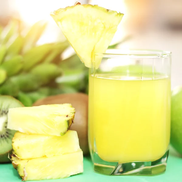 Pineapple juice on a light background