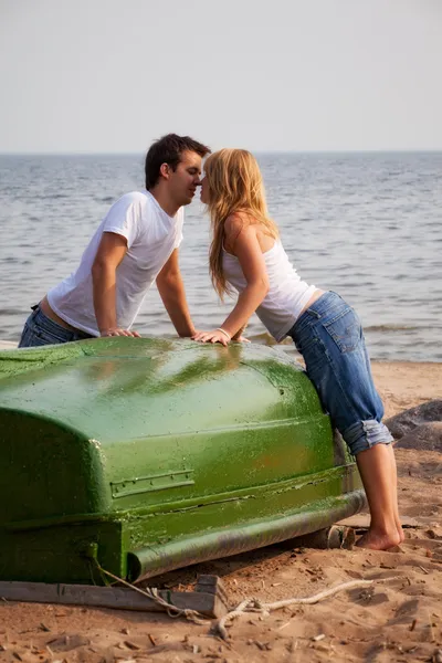 Beautiful couple kissing on a beach