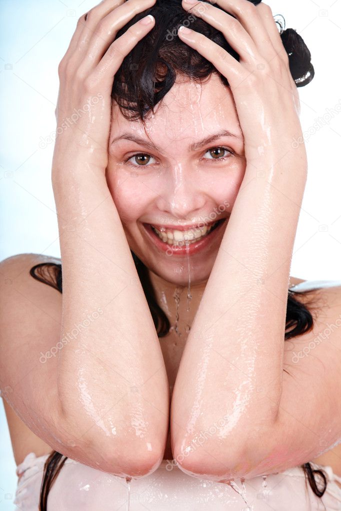 Beautiful young woman take shower