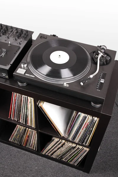 Turntable and Dj mixer on black table