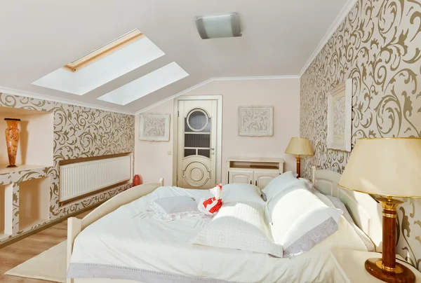 Modern art deco style bedroom interior in light beige colors on