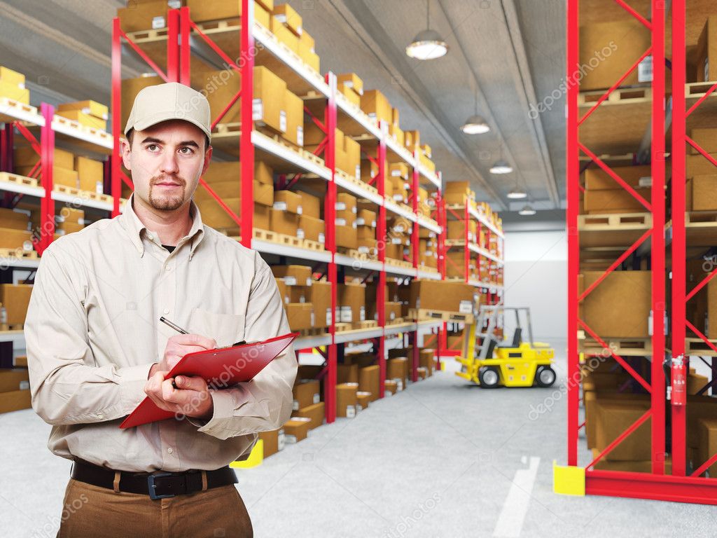 Delivery man in warehouse — Stock Photo © jukai5 4715736