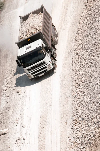 Truck transporting building material