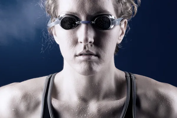 Muscular woman swimmer