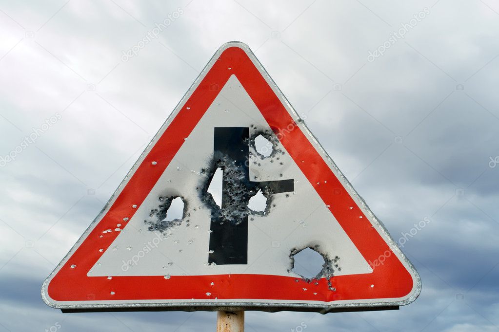 Road sign with bullet holes — Stock Photo © bashta 4452384