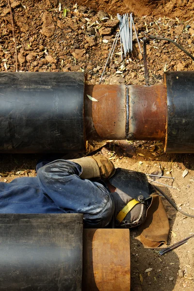 Worker welder pipe pipeline
