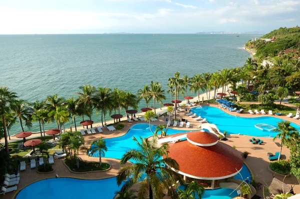 Swimming pools and bar at the beach of luxury hotel, Pattaya, Th