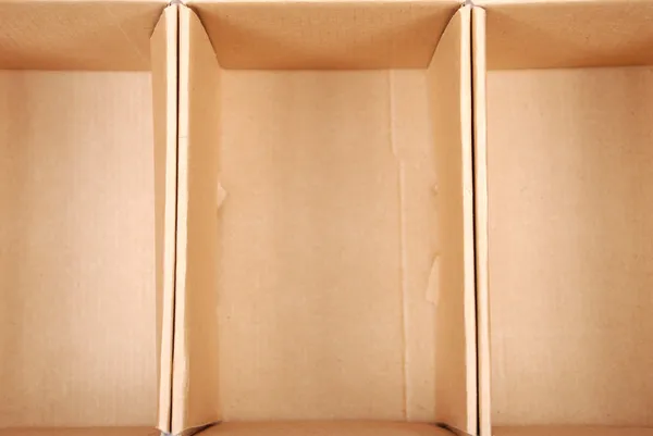 Close-up of three open cardboard boxes