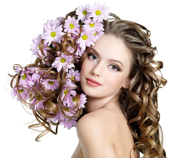 http://static5.depositphotos.com/1001992/520/i/450/depositphotos_5205463-stock-photo-spring-flowers-in-hair-of.jpg