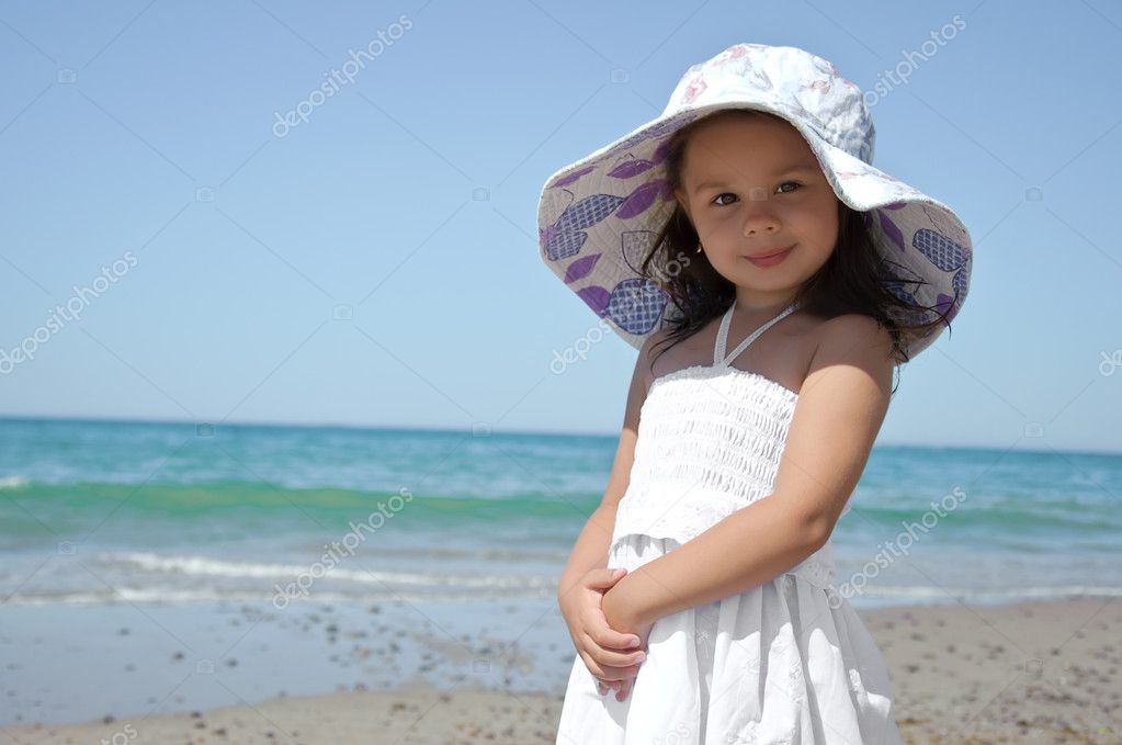 Download this Little Girl The Beach Stock Image picture