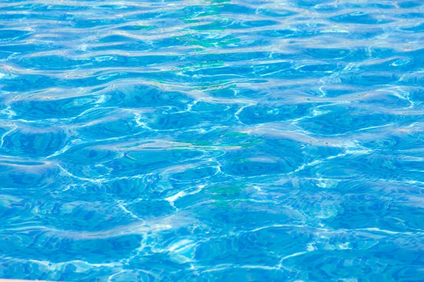 Blue clean water at the pool