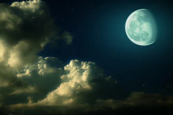 Moon, clouds and stars night landscape
