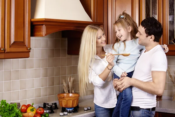 Family in kitchen