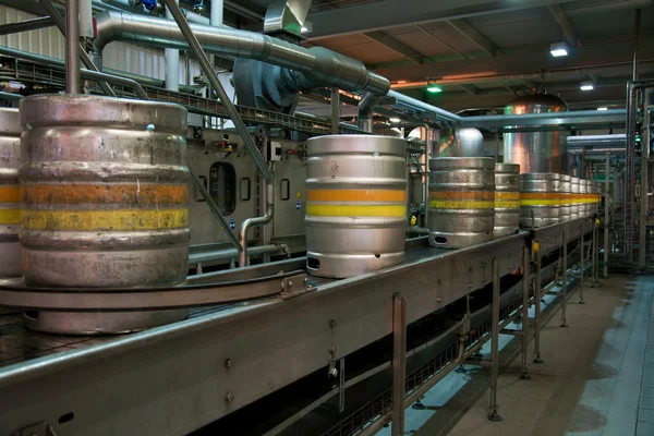 Beer kegs on the production line in the factory