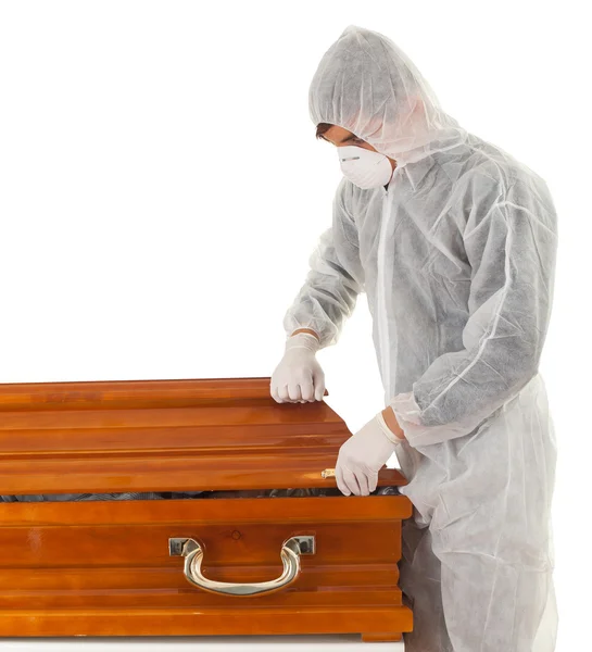 man in coffin