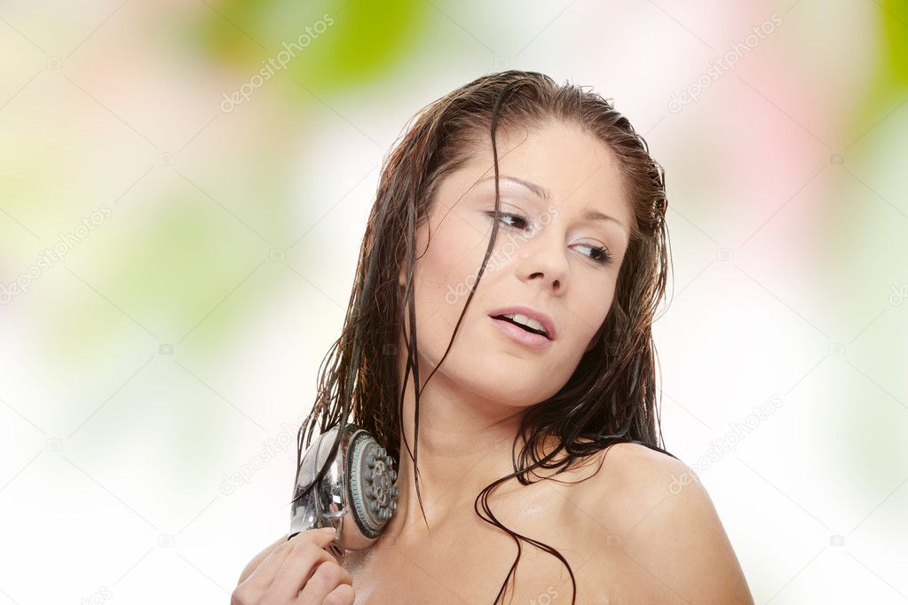 Young woman singing under shower isolated on white