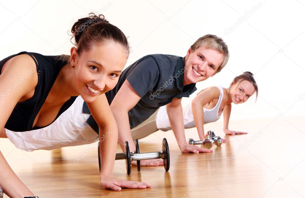 group-doing-fitness-exercises-stock-photo-yekophotostudio-4300775