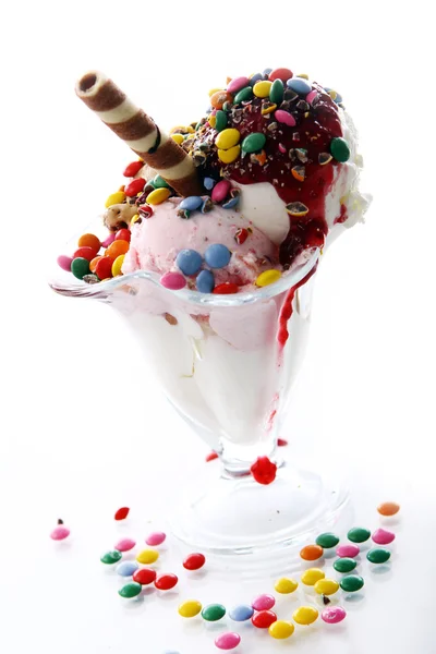 Ice cream dessert with colorful candies