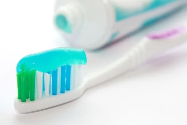 Dental brush with a tooth-paste