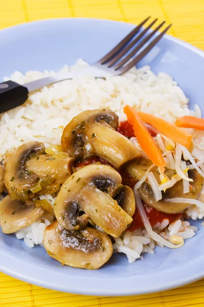 Mushrooms and vegetables with cooked rice