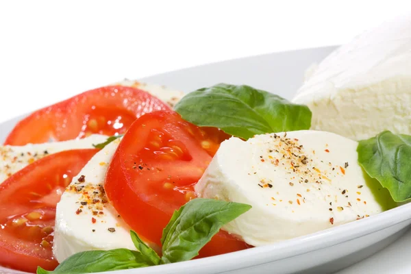 Salad with mozzarella and tomatoes