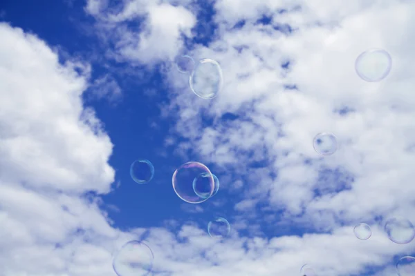 Bubbles on a cloudy sky
