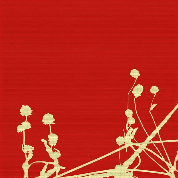 Seed heads and stems on red ribbed background