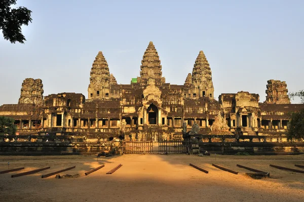 Temple of Angkor Vat in rising sun beams.