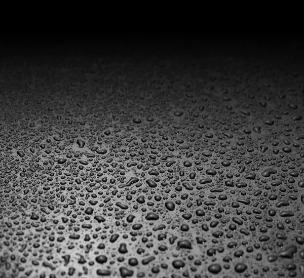 Black water drops background