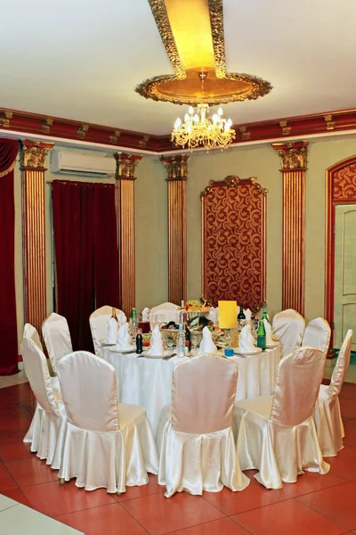 Table setting at a luxury wedding reception by Tatiana Belova Stock Photo