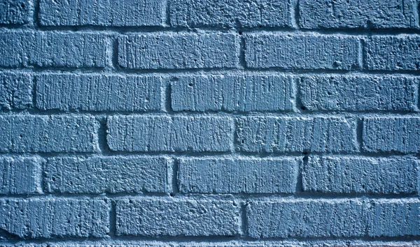 Blue painted brick wall