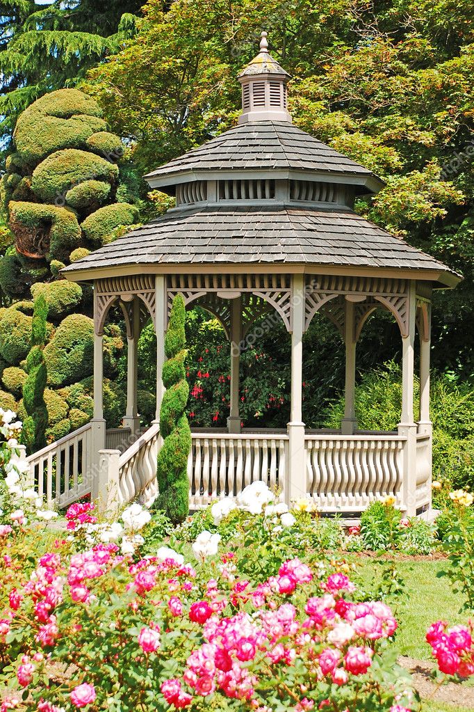 Wooden gazebo in rose garden — Stock Photo © montana #5182921