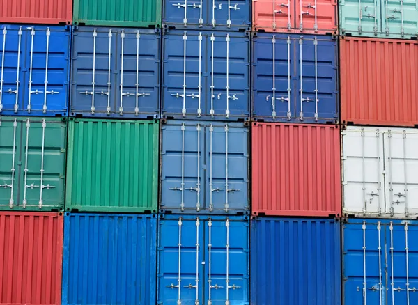 Multi-colored freight shipping containers at the docks