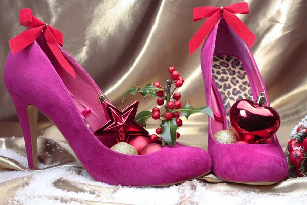 High heel shoes with Christmas decorations closeup