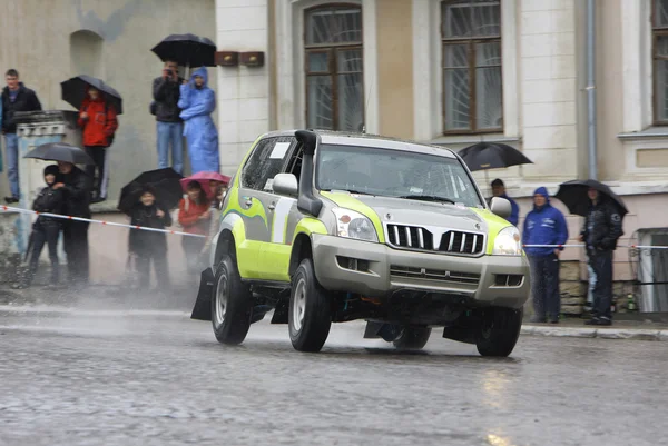 Rally off-road car on wet road