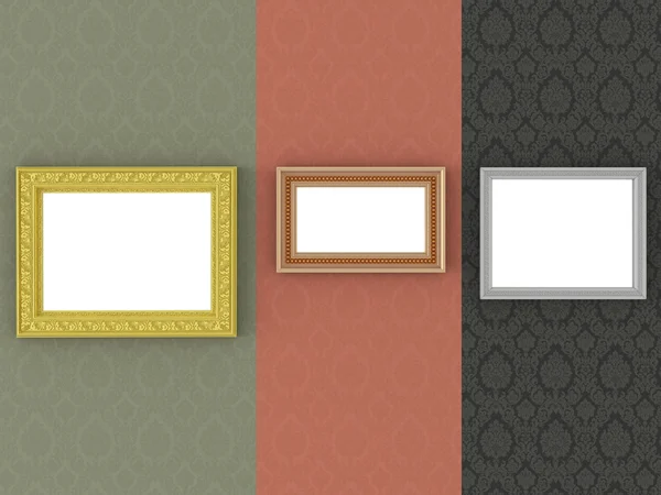 Three gold picture frames on the vintage wallpaper