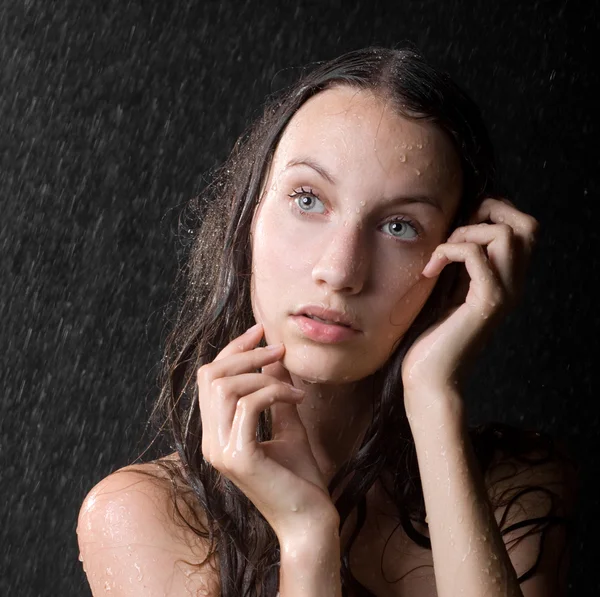 Portrait of pretty teen girl in water studio by Irina Pussep Stock Photo