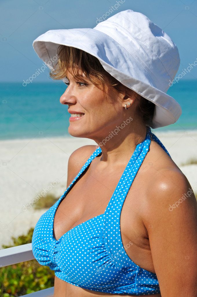 Attractive Woman On The Beach Stock Photo Image By EyeMark 5304542