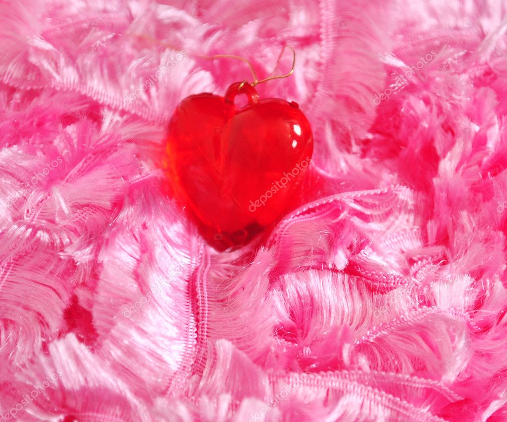 free pink background images. Red heart on a pink background