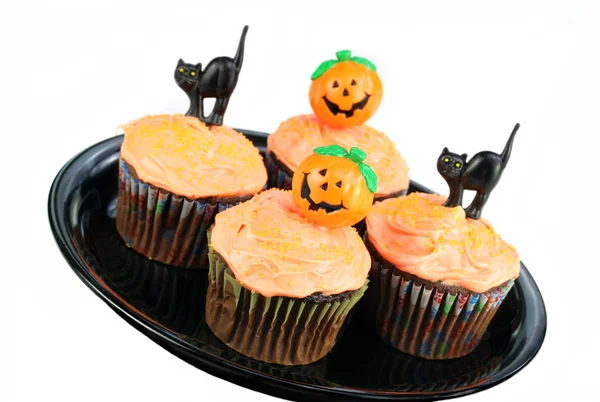 Decorated Halloween Cupcakes on White