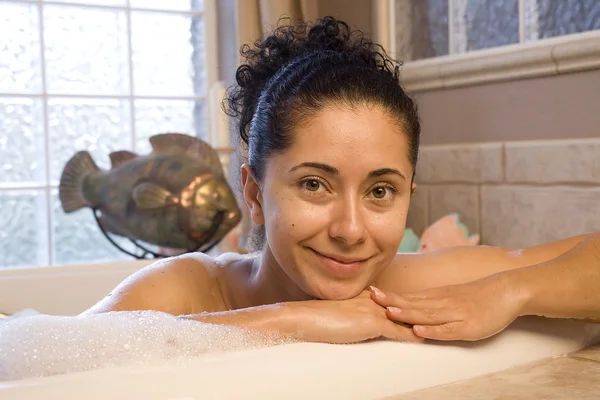 Woman taking bubble bath