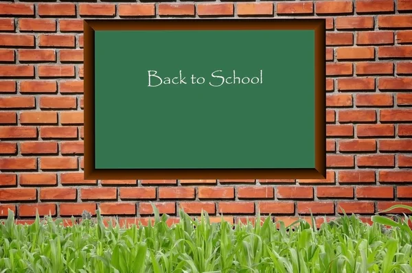 Black board school and brickwall pattern — Stock Photo #4182689