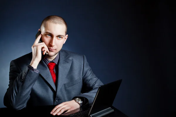 Businessman calling by phone
