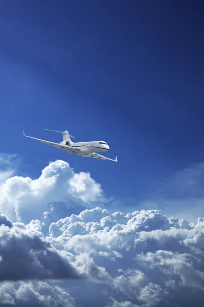 Private jet plane in a blue sky