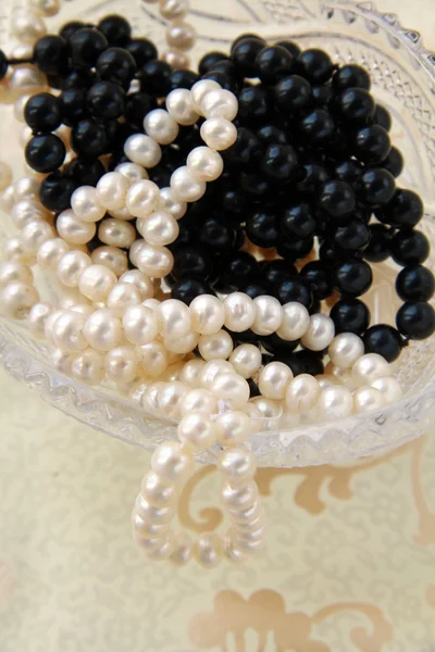White and black pearls