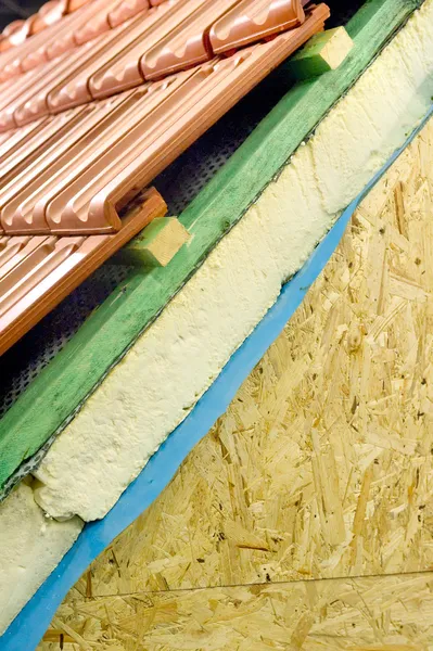 Thermal insulation of a house roof