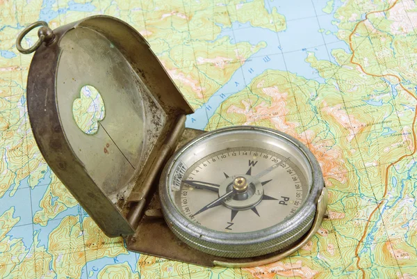 Compass on topographical map