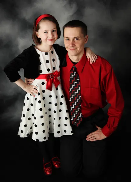 Daddy and daughter dressed up