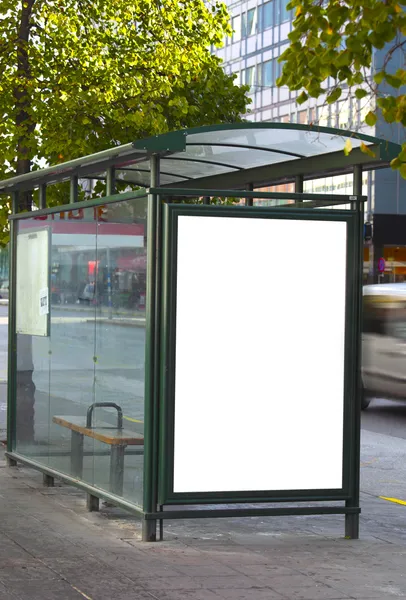Bus stop with a blank billboard